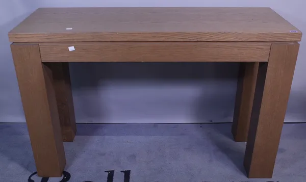 A 20th century oak rectangular console table on block supports, 120cm wide x 76cm high.