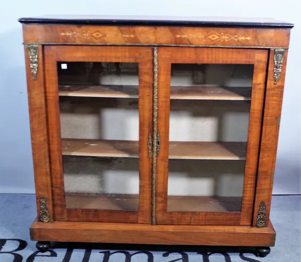 A Victorian walnut marquetry inlaid two door side cabinet, on bun feet, 102cm wide x 101cm high.