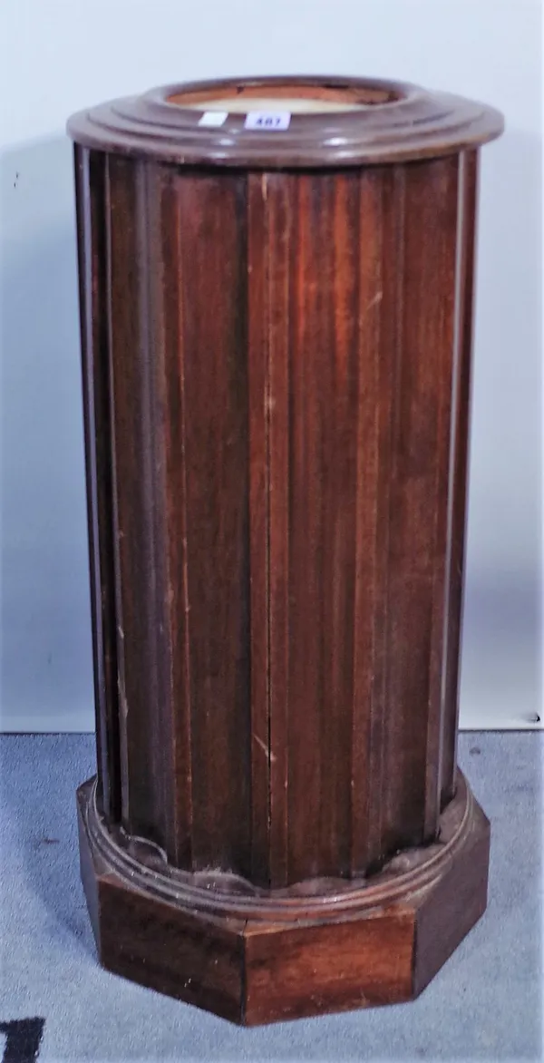 An early 20th century mahogany marble topped jardiniere stand and a 19th century mahogany folding rocking chair, (2).