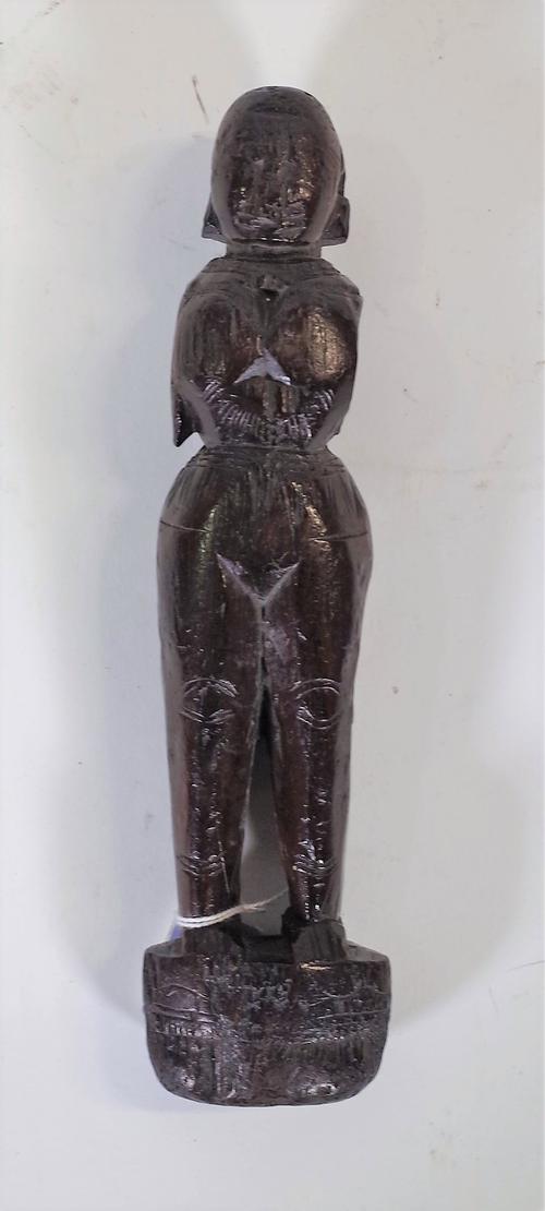 A hardwood carved tribal figure, possibly early 19th century Indian or Asian, (a.f.), 25cm.