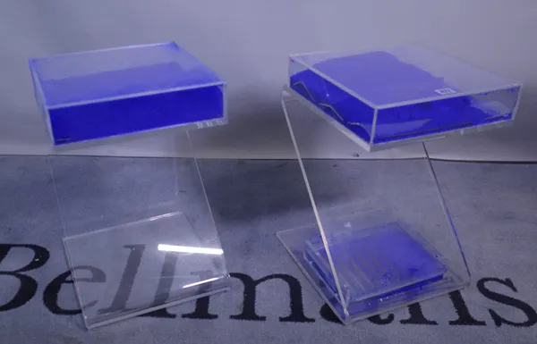 A pair of 20th century perspex side tables of 'Z' form filled with blue powder, 30cm wide x 46cm high, (one a.f.).  Provenance; property from the late