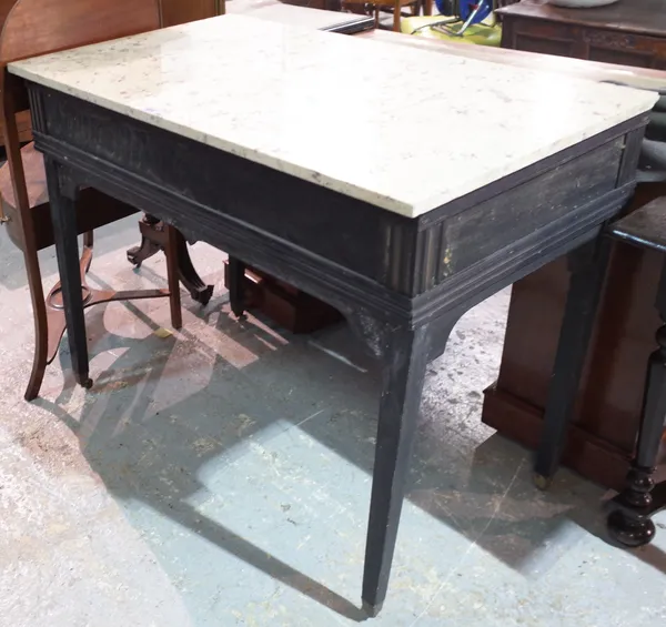 A 19th century marble topped rectangular centre table on an ebonised base with tapering supports, 108cm wide x 88cm high.  Provenance; property from t