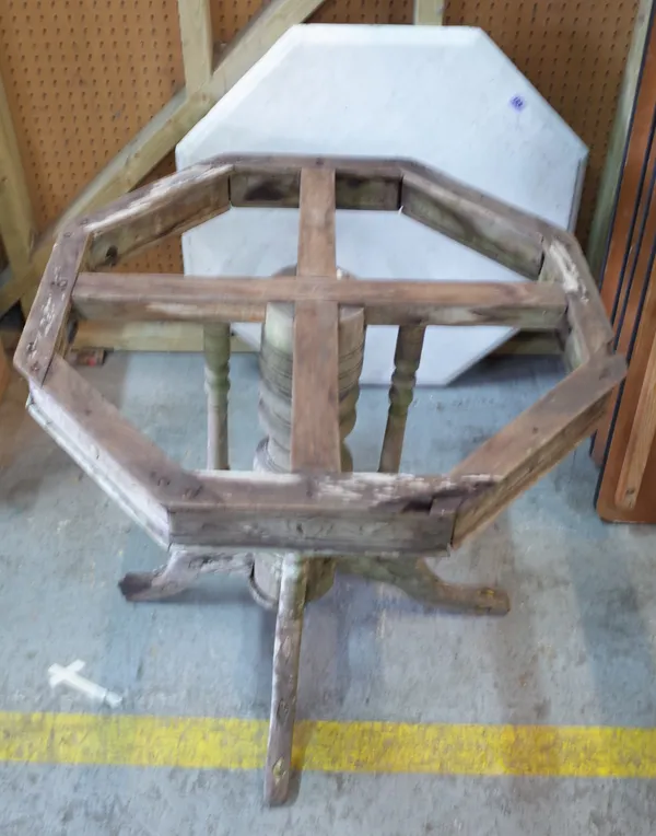 An early 20th century pine octagonal centre table white marble top 75cm wide x 73cm high, (a.f.).   Provenance; property from the late Sir David TangT