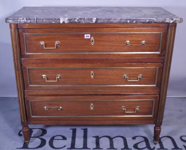 A 19th century French marble topped commode, the shaped marble over three long drawers on tapering supports, 96cm wide x 89cm high.  Provenance; prope