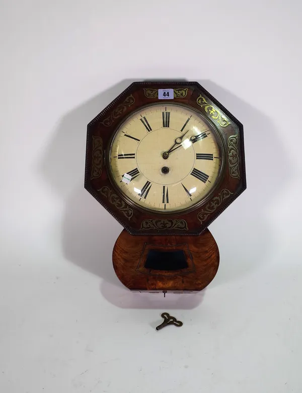 A late Victorian mahogany and brass inlaid octagonal wall clock, 31cm wide x 43cm high.