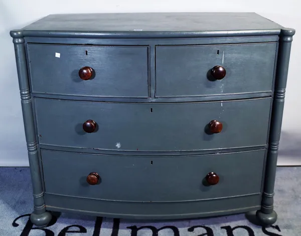 An early 19th century, later grey painted, mahogany bowfront chest of two short and two long graduated drawers, with outstepped turned supports, 110cm