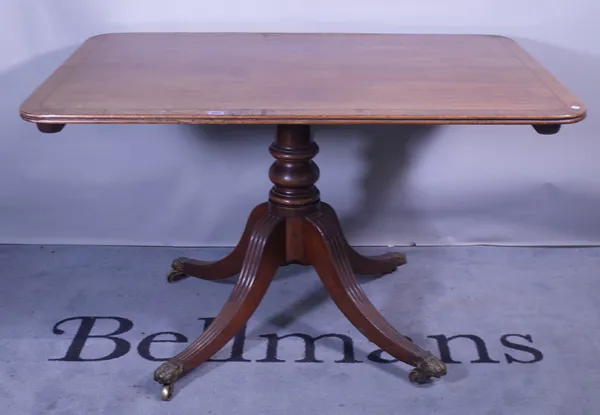 A George III inlaid mahogany rectangular snap top breakfast table, on four downswept supports, 119cm wide x 72m high.