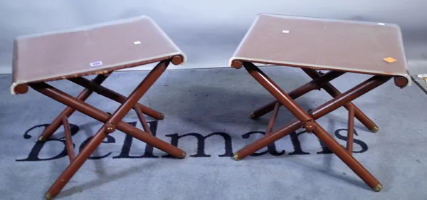 A pair of 20th century tan leather upholstered folding seats, converted to tables with perspex tops, 47cm wide x 41cm high, (2).