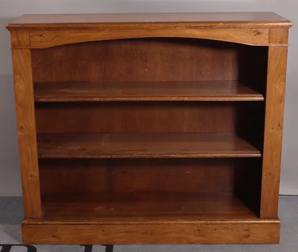 A walnut floor standing open bookcase, on plinth base, 105cm wide x 90cm high.