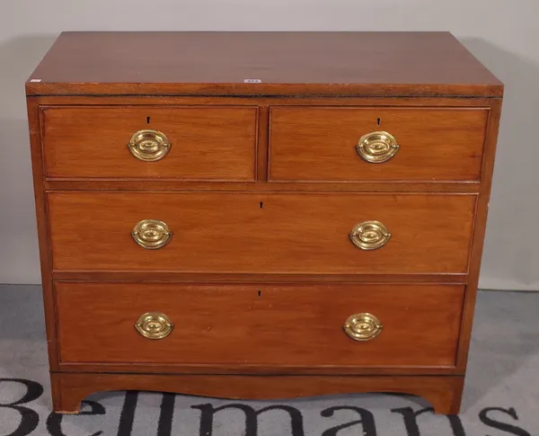 A pair of George III style mahogany chests with two short and two long drawers, on bracket feet, 89cm wide x 75cm high.