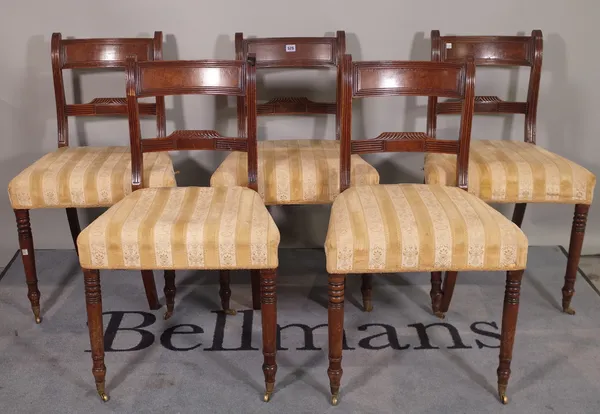 A set of Regency mahogany bar back dining chairs on tapering supports, (6).