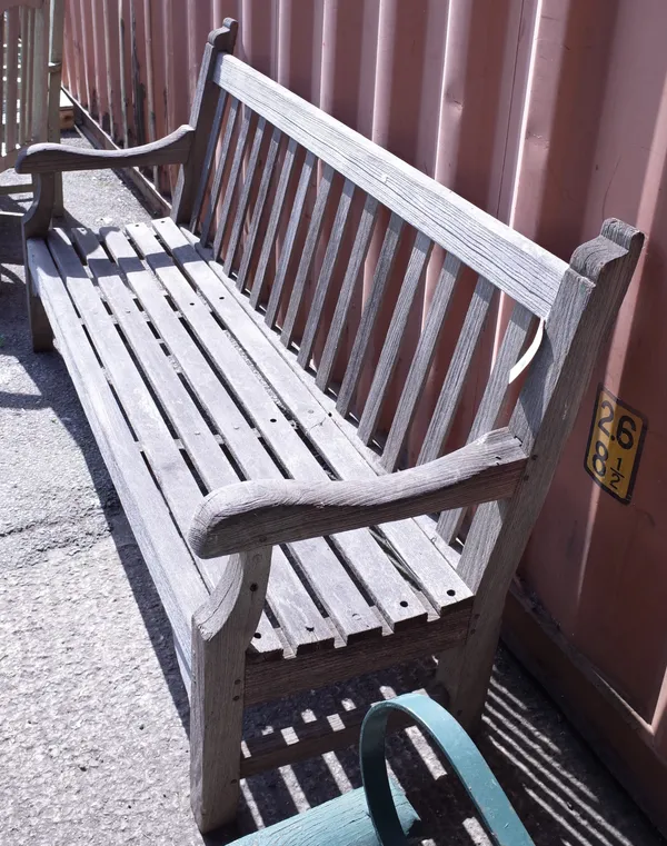 A 20th century hardwood garden bench, 183cm wide x 100cm high.