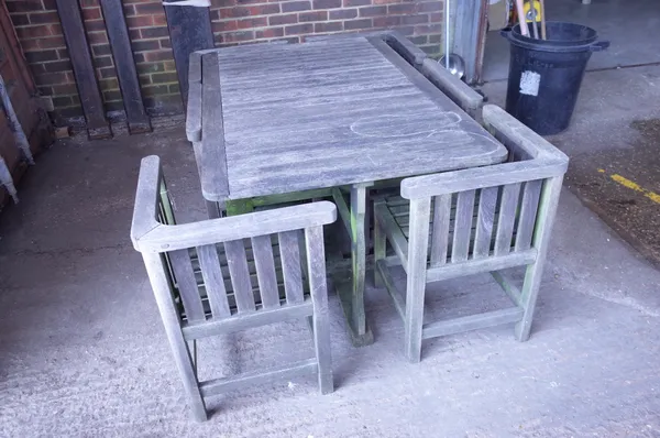 In the manner of Heals, a 20th century Cooper Craft hardwood rectangular garden table, 146cm wide x 71cm high, with six matching chairs and two hardwo