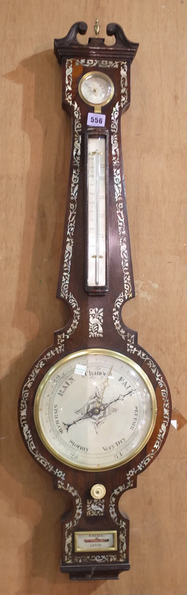 A 19th century rosewood and mother-of-pearl inlaid wheel barometer, 101cm high.