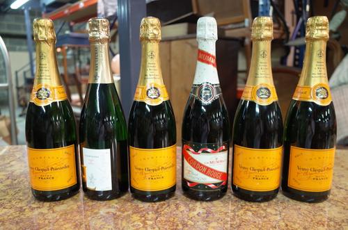 Four bottles of Veuve Clicquot Ponsardin champagne, one bottle of Cordon Rouge Mumm & Co champagne and one Legras champagne, (6).