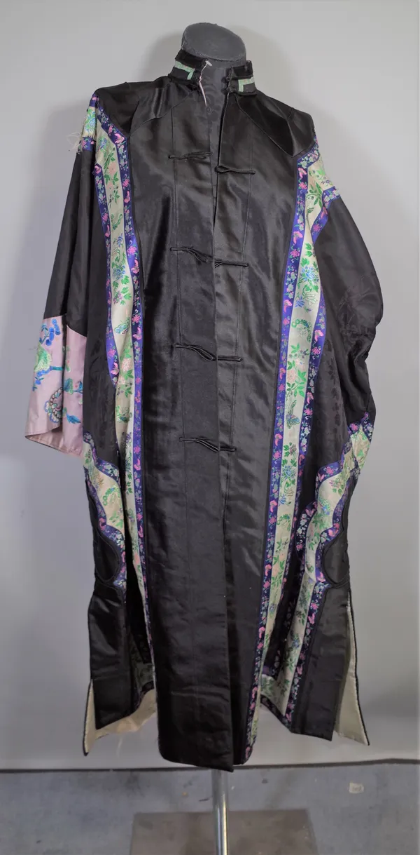 An early 20th century Chinese robe with embroidered decoration, (a.f.) and further  textile panels.