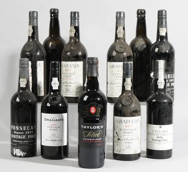 Twelve bottles of port comprising; Four 1977 Grahams Vintage, two 1977 Fonseca's Finest Vintage, 1976 Taylors Quinta de Vargellas Vintage, 1980 Graham