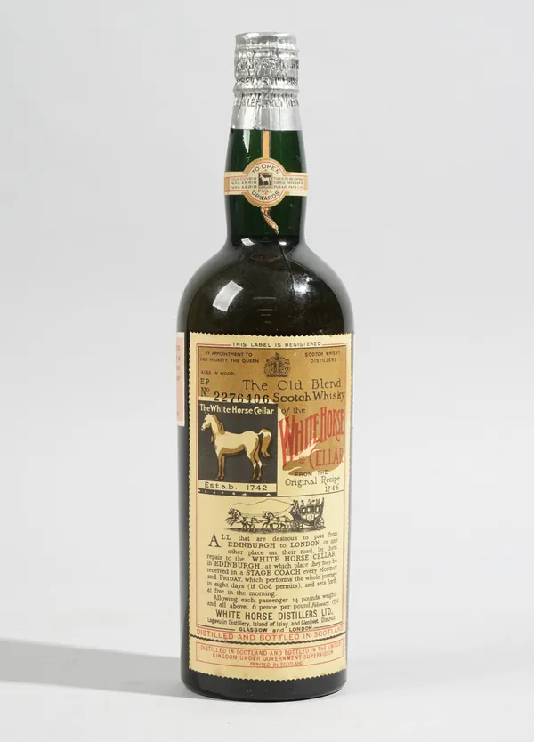 One bottle of White Horse Scotch Whisky, circa 1950.