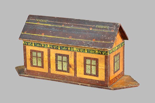 A polychrome painted wooden Noah's Ark and animals, early 20th century, probably German with hinged roof and a large quantity of painted wooden animal