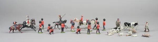 A quantity of Britains hollow cast lead soldiers, farmyard animals and accessories, (qty).