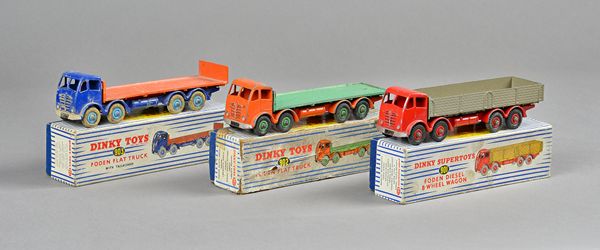 Three Dinky vehicles; 901 Foden diesel eight wheel wagon, 902 Foden flat truck and a 903 Foden flat truck with tail board, all boxed, (3).