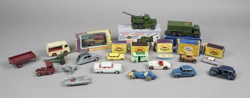 A quantity of die-cast vehicles, including; 661 Dinky recovery tractor, Dinky 622 10 ton army truck, five boxed Matchbox Lesney cars, Dinky Austin tax