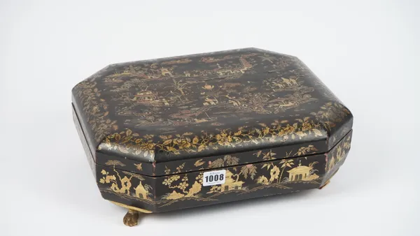 A 19th century Cantonese export lacquer box, chinoiserie decorated, of canted rectangular form with further smaller boxes to the interior, on four lio