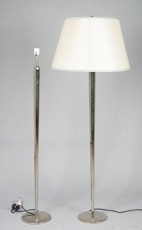 A pair of modern chrome octagonal standard lamps of tapering form on circular plinth bases, 160cm high, (2).
