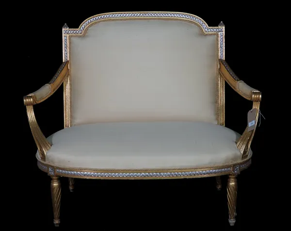 Brights of Nettlebed; a Louis XV style gilt wide seated fauteuil with square back and spiral fluted supports, 109cm wide x 92cm high.