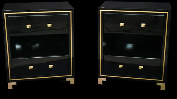 A pair of modern black lacquer two drawer side cabinets with brass inlaid decoration and brass feet, 65cm wide x 78cm tall.