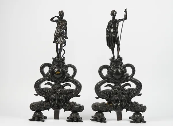 A pair of Victorian style patinated figural chenets, modelled as Diana the Huntress and David, over a Bacchus mask & twin turtle cast feet, 69cm high,