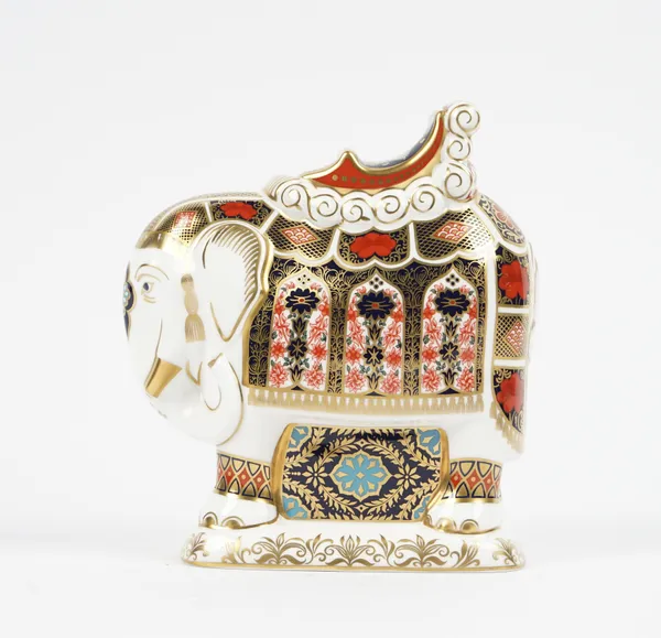 A Royal Crown Derby Imari decorated 'Elephant' paperweight, gold button to base, red printed marks, 21cm high.