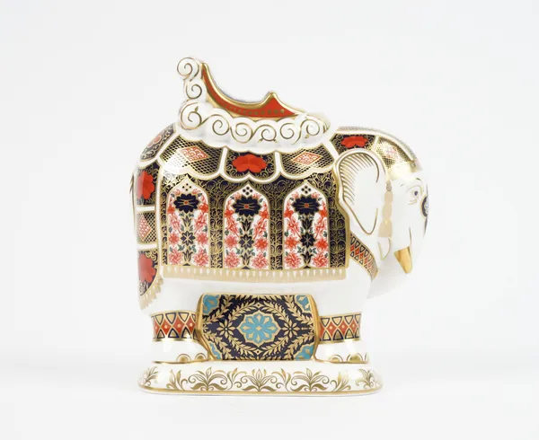 A Royal Crown Derby Imari decorated 'Elephant' paperweight, gold button to base, red printed marks, 21cm high.
