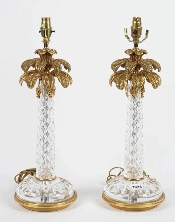 A pair of Italian gilt metal and crystal table lamps formed as palm trees, each raised on a circular base, 43cm high, (2).
