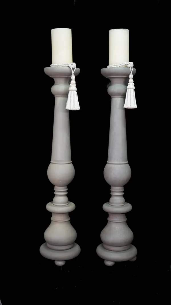A pair of large modern grey painted wooden candlesticks, 154cm high.