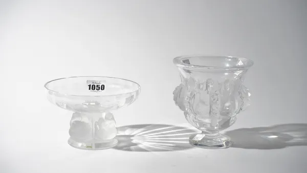 A Lalique glass dish modelled with birds, 14cm diameter, and another by Lalique (chipped), 12cm diameter.