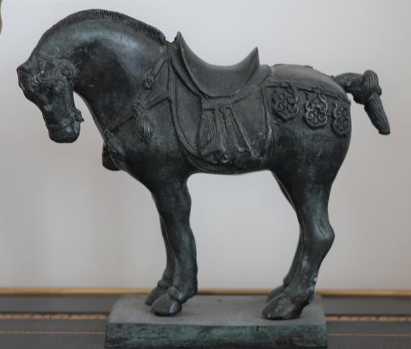 A patinated bronze horse, 23cm high.