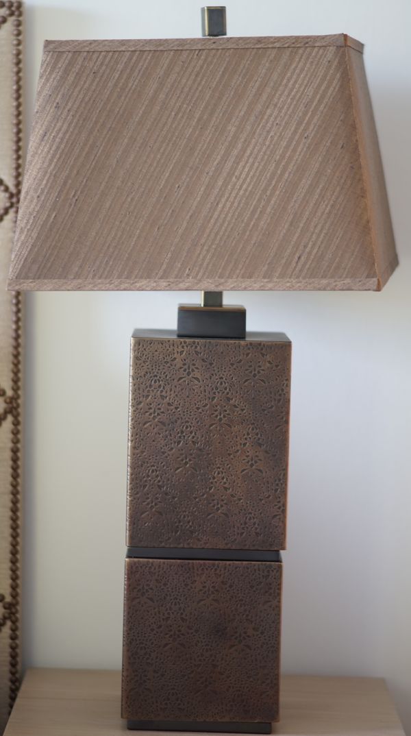 A pair of patinated brass rectangular section table lights, 85cm high.