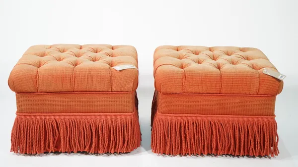 Lewis Mittman; a pair of modern rectangular red upholstered and tasselled footstools, 70cm wide x 45cm high.