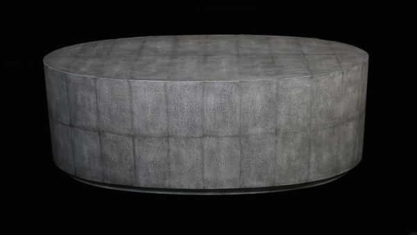 A modern faux shagreen oval coffee table, 122cm wide x 45cm high.