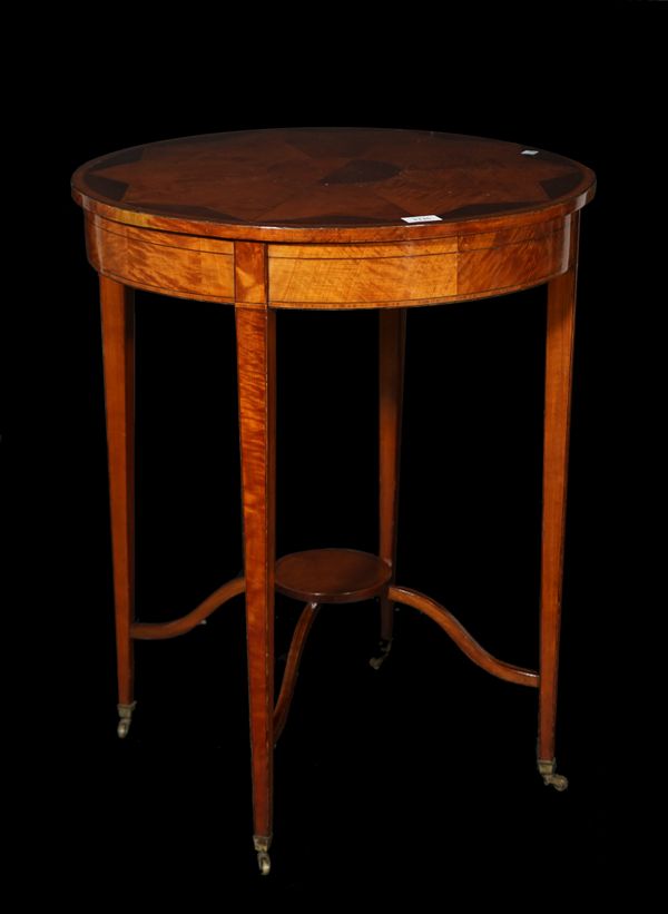 A Victorian inlaid mahogany circular occasional table united by platform undertier on tapering square supports, 61cm wide x 77cm high.