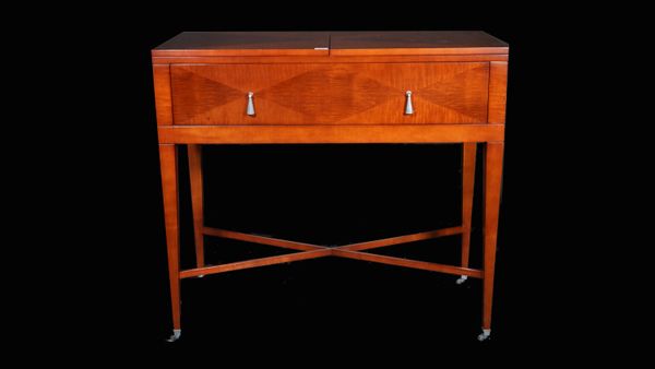 Baker, a modern mahogany single drawer extending side table united by 'X' frame stretcher, 103cm x 205cm fully extended x 94cm high.