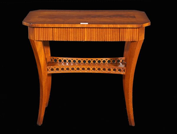 A Regency style mahogany single drawer low side table with a galleried undertier on outswept supports, 67cm wide x 63cm high.