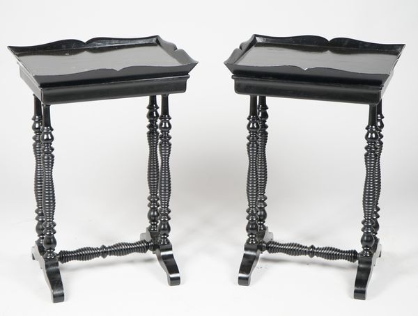 A pair of Victorian style ebonised single drawer side tables on ring turned dual ended supports, 48cm wide x 69cm high.