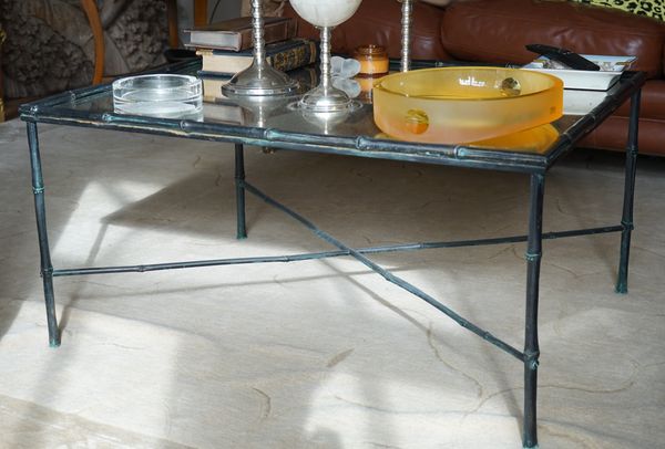 A bronze faux bamboo metal low table with mirrored top, 90cm wide x 45cm high.