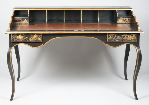 A modern chinoiserie decorated writing desk, with two frieze drawers, on sabre supports, 138cm wide x 93cm high.