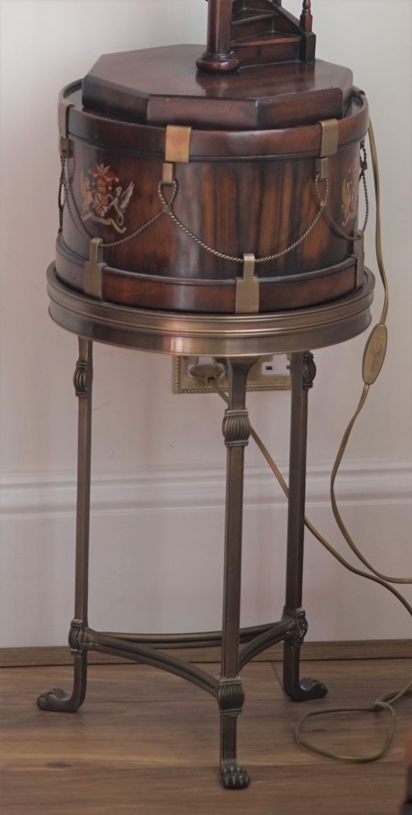 A gilt metal and wood occasional table with a drum top, 31cm diameter x 65cm high.