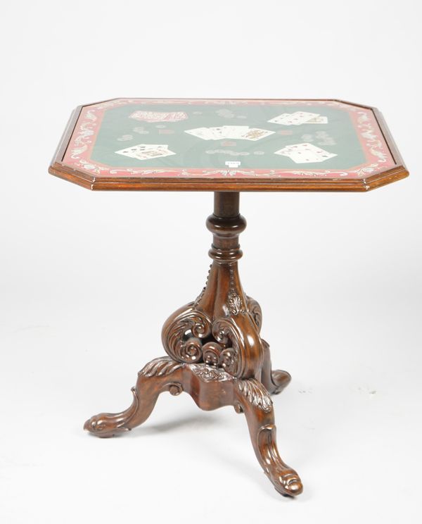 A William IV style octagonal carved hardwood occasional table, with painted and glazed top, 77cm wide x 78cm high.