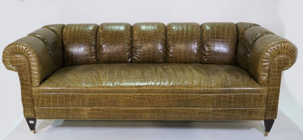 Baker; a green Chesterfield style sofa, with faux crocodile skin leather upholstery, on block supports, 205cm wide x 73cm high.