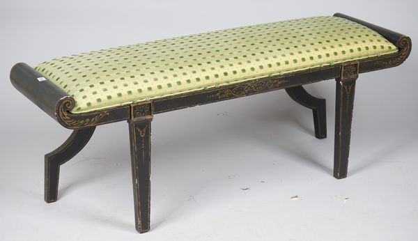 A modern Italian black and parcel gilt painted window seat with rollover arms, on tapering square supports, 142cm wide x 52cm high.